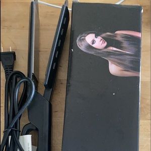 Hair straightener. Brand new in box.